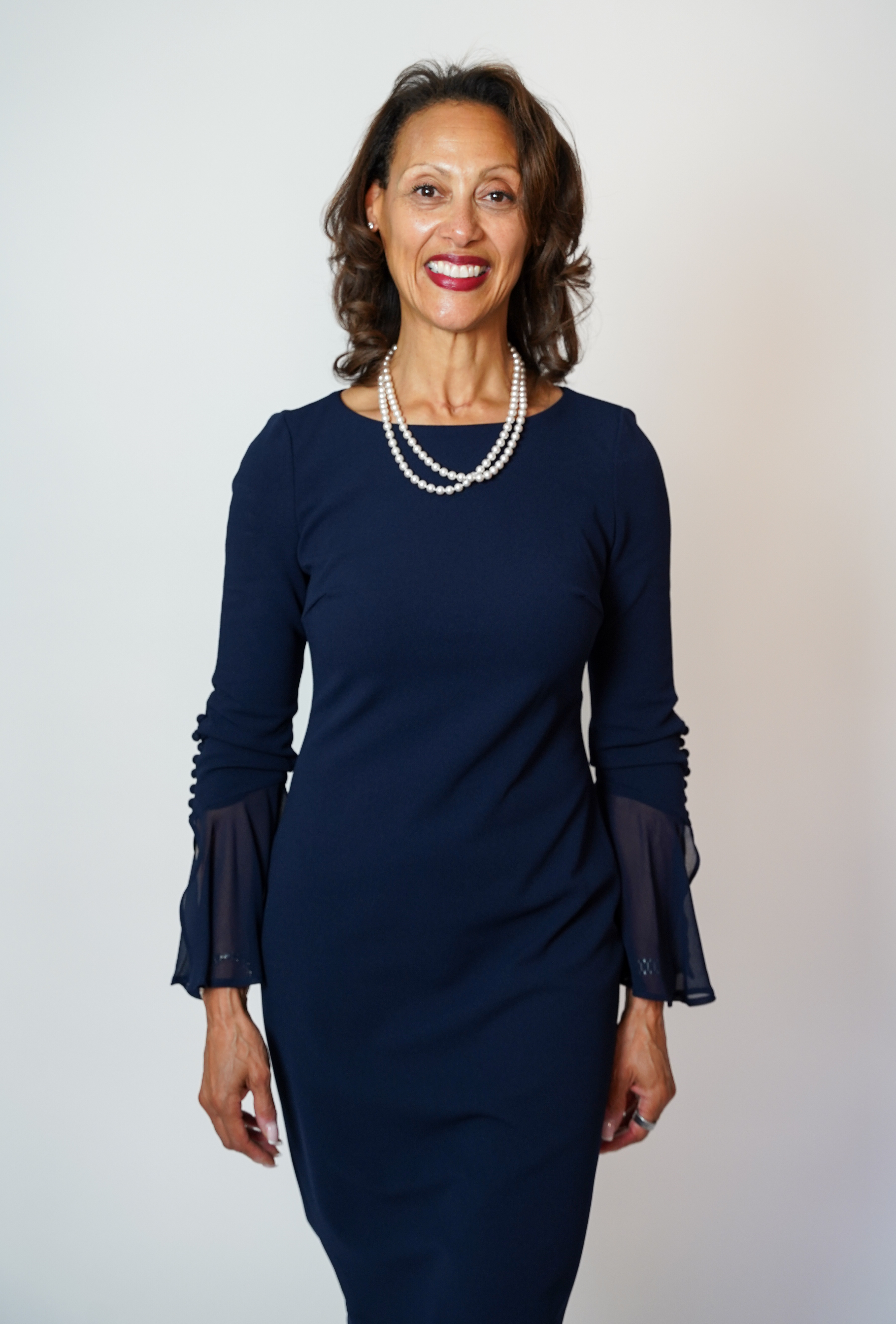 ./DawnMarieHeadshots-Cover_Photo_BlueDress_Standing_1791160347635